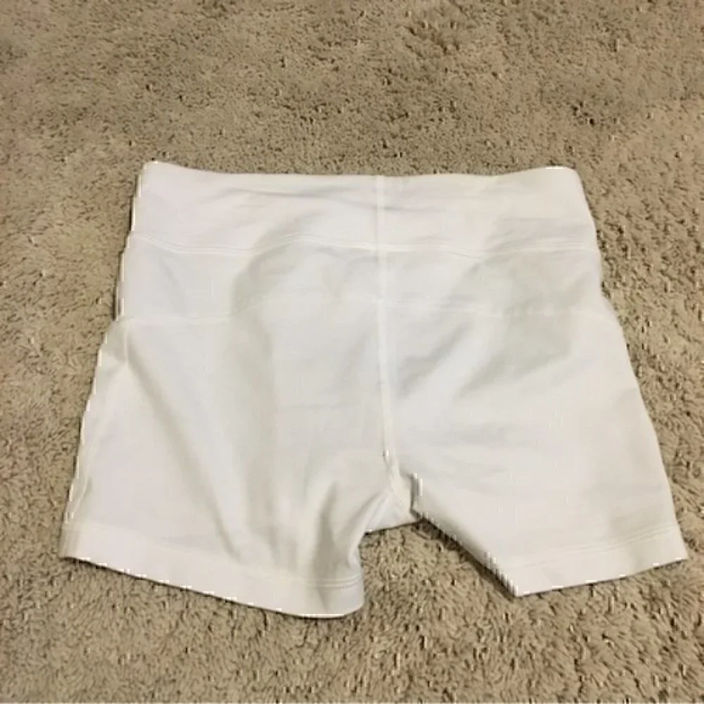 Under Armour woman’s size xsmall white spandex shorts
